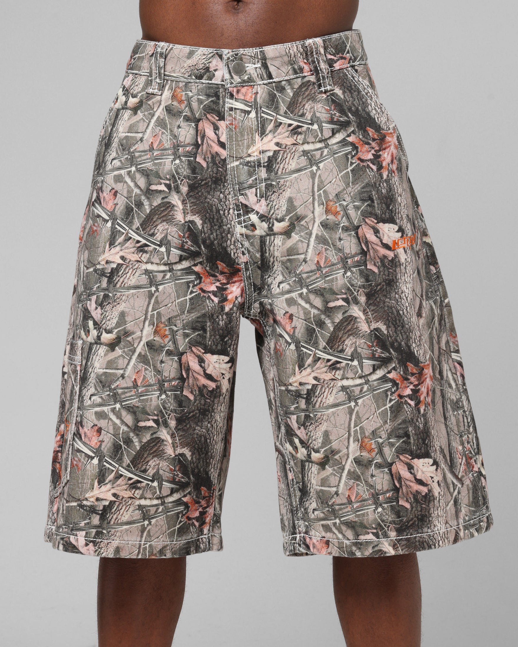 Loiter Biker Jorts Real Tree Camo